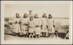 [Group of Aklavik residents standing in front of harbour] 1932
