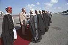 Pierre Trudeau in Kuwait with officials (greeting them) 1980 - 1984