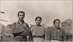 [Anishinaabe residents of Wiikwemkoong First Nation, identified as Frank Micibenifima, his sister-in-law, and his aunt] [ca. 1916]