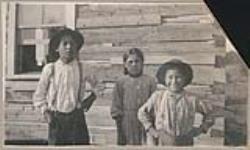 [Unidentified portrait of two First Nations boys and a girl] [between 1910-1921]