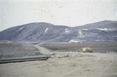 [Landscape view of empty construction site] 1956