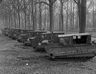 Canadians in Belgium, near Turnhout. RCOC #11 Cdn. Army Roadhead, under command of Lt-Col. Denney. Vehicle Park and Workshops. Weasels 22 February 1945.