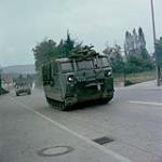 Fall Ex. Germany. M548 in town followed by APC September 1977.
