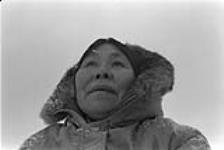 [Portrait of Kenojuak Ashevak outdoors in snow] November 1980.