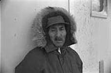 [Portrait of Abraham Etungat outdoors] December 1980