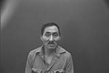 [Studio portrait of Abraham Etungat, West Baffin Cooperative] December 1980