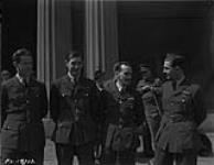 Photo taken after investiture shows (left to right) F/O P.M. Anderson, F/L Charles R. Blumenhauer, P/O John Van Rassel and F/L J.A. Spence 15 July 1943.