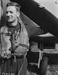 Photo of W.R. Bill Tew RCAF Fighter Pilot WW2 wearing Mae West Life Jacket 30 May 1944.
