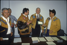 [Officials posing with a cheque during the signing of the Gwich'in comprehensive land claim agreement] [1992/04/21-1992/04/23]