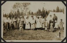 [Group shot of Anishinaabe women and their children during Treaty time, Obishikokaang (Lac Seul First Nation), Ontario 1929] Original title: Treaty Time, Lac Seul, 1928 1928