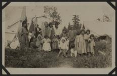 [Group shot of Anishinaabe women and their children during Treaty time, Obishikokaang (Lac Seul First Nation), Ontario 1929] Original title: Treaty Time, Lac Seul, 1928 1928