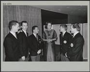 Miss Meagher with the Men's Figure Skating team February 1964.