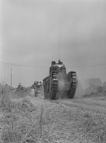 Canadians in France: Beauregard Rest Camp near Caen : Tanks on the move August 6, 1944