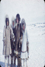 [Four Inuit girls wearing print, cotton and fur-lined parkas] [between 1950 and 1960]