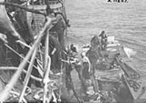 [Canadian troops boarding a destroyer after raid on Dieppe, France, 19 August 1942.] August 19, 1942.