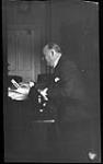 Richard Bedford Bennett, Prime Minister of Canada, in his office, West Block, Parliament Bldgs ca. 1933