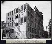 Federal District Improvement Commission Records. Demolishing Russell Block. View looking north on Canal Strreet 1927
