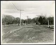 [Road construction on present-day Colonel By Drive site] [1927-1932].