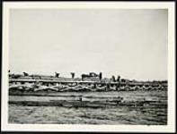 [Logs being hauled for construction of Champlain Bridge] cira 1924-1928.