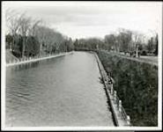 Federal District Improvement Commission Records. View of south side Canal bank from Bronson Avenue bridge November 5, 1929