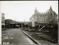 [View of paritally constructed Plaza Bridge and driveway along the Rideau Canal] November 19, 1938