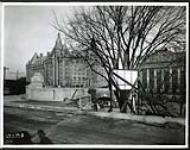 [View of new Plaza Bridge stone railing from Elgin Street with Chateau Laurier in background] January 9, 1939