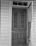 [The Ottawa Country - photo credit 81] Cast-iron screen on front door, Shaw residence, Navan ca. 1968