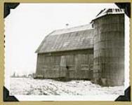 Garnet Munro Farm - Innes Road [Partial exterior view of barn and silo] November 22, 1961