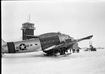 United States Air Force aircraft C-41 on skis in front of Crystal II hangar 1950
