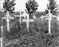 The graves of Capt. H.H. Pineo and Lt.-Col. G.H. Baker, Commanding Officer, 5th Canadian Mounted Rifles. July 1918.