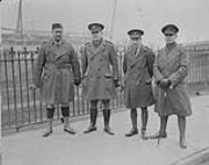 Departure of 3rd Canadian Division per S.S. "Adriatic" from Liverpool, March 1st 1919. Capt. Young, Major Courtney, Capt. Drummond and Capt. Rackham of the Canadian Embarkation Staff at Liverpool March 1, 1919.
