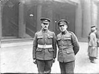 Sgt, W.L. Rayfield, V.C. at left. 7th Bn 8 Mar. 1919