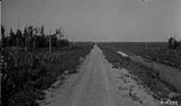 Improved road across marsh. Tp. 23-1-E., 1922