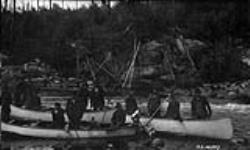 Indians freighting in the mining country, Lac Seul, Ont 1926