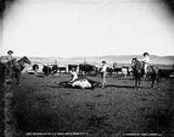 Branding cattle "J.L." Ranch, Maple Creek, N.W.T. [Sask.] 1908