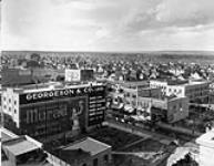 View of Calgary, Georgeson & Co. Ltd. ad. on the wall n.d.