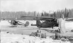 Aircraft of the Saskatchewan - Alberta Boundary Commission, McMurray, Alta., [left to right]: Beechcraft C-17R CF-BBB; Noorduyn 'Norseman' III CF-BAM