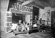 Inside a home at Cap a l'Aigle ca. 1900 - 1910