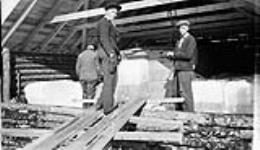 (Relief Projects - No. 81). Storing ice in the ice house Apr. 1934