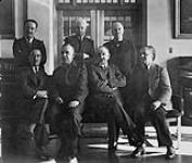 Photo of seven men taken at the Public Archives of Canada 1945