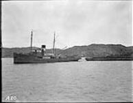 (Hudson Strait Expedition) Tug Ocean Eagle with barge of material for Base 'A' Sep 1927