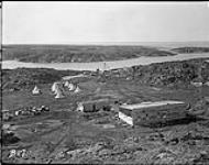 (Hudson Strait Expedition) Base 'B' (L. to R.) camp, temporary shack, mens' residence Aug. 1927