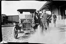 Ford car near Railway Depot ca. 1912