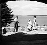 The verandah, Golf Club House, Waskesiu Lake in background, Prince Albert National Park, Sask Aug., 1935
