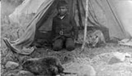 [First Nation boy and pets]. Original title: Indian boy and pets 25 July 1906.