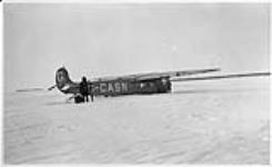[Damaged Fokker 'Super Universal' aircraft G-CASN of Canadian Airways Ltd., Fort Resolution, N.W.T., January 1929.]