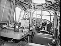 [Wireless installation in Avro 'Anson' aircraft of the R.C.A.F., Rockcliffe, Ont., 30 July 1941.] 30 July 1941