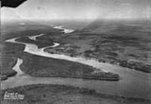Ogoki Post on Albany River looking North, showing landing area. [Ontario] [1935]