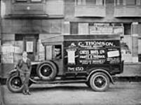 Syd Thompson's truck - produce broker44 - 200 Blk and 2nd Avenue 1930