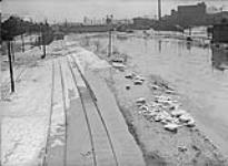 Result of ice jam in the Don River, view looking south from Queen St. bridge, Toronto, Ont Feb 26, 1918